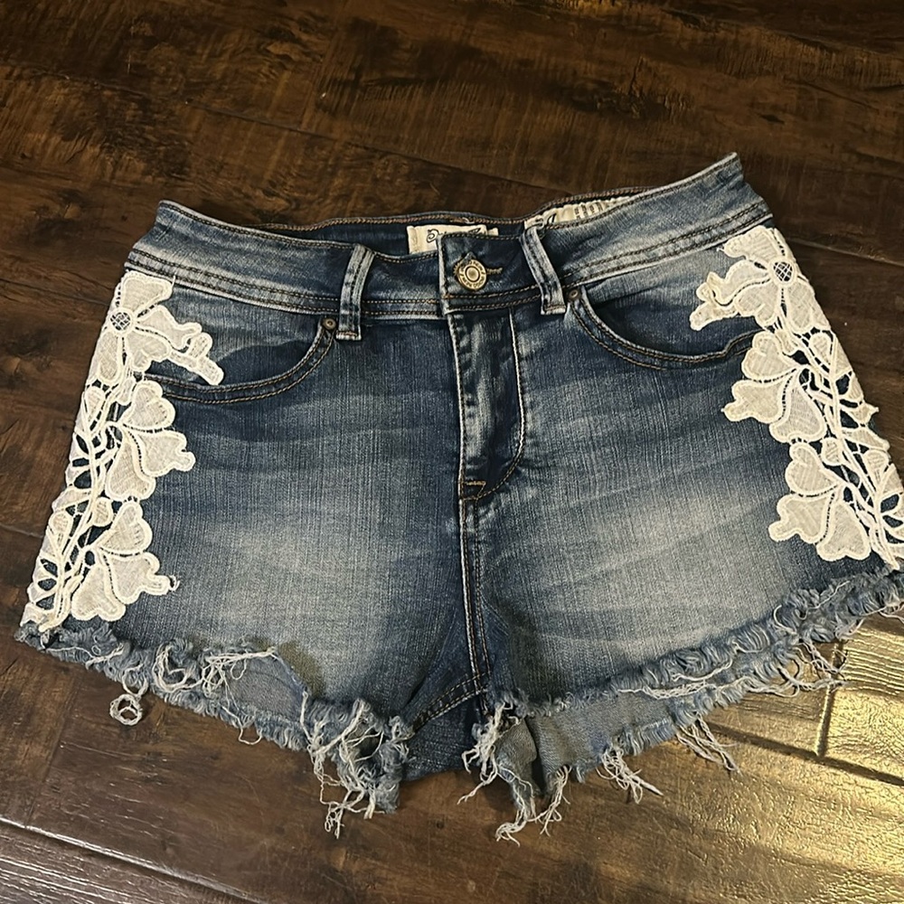 Jean shorts with Lace Floral Detail. Jean Shorts & Jeans $12 or 2x$20 - Picture 1 of 3